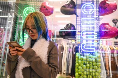 a Chinese woman checking her AI boyfriend
